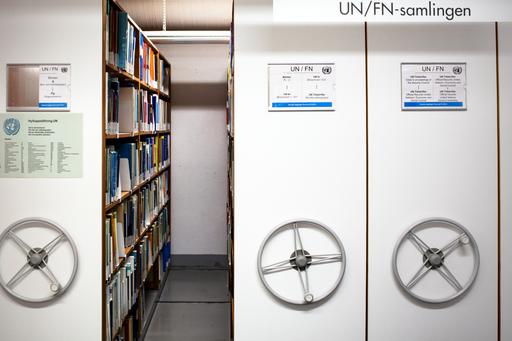 Compact shelving units with UN materials.